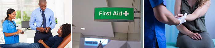 woman lying on first aid couch; first aid room sign in business centre; woman’s hand being treated on first aid couch