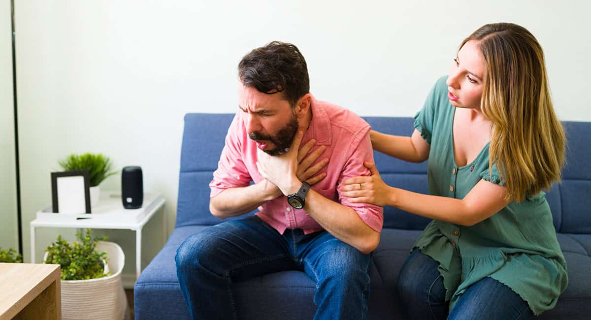 An image of someone choking