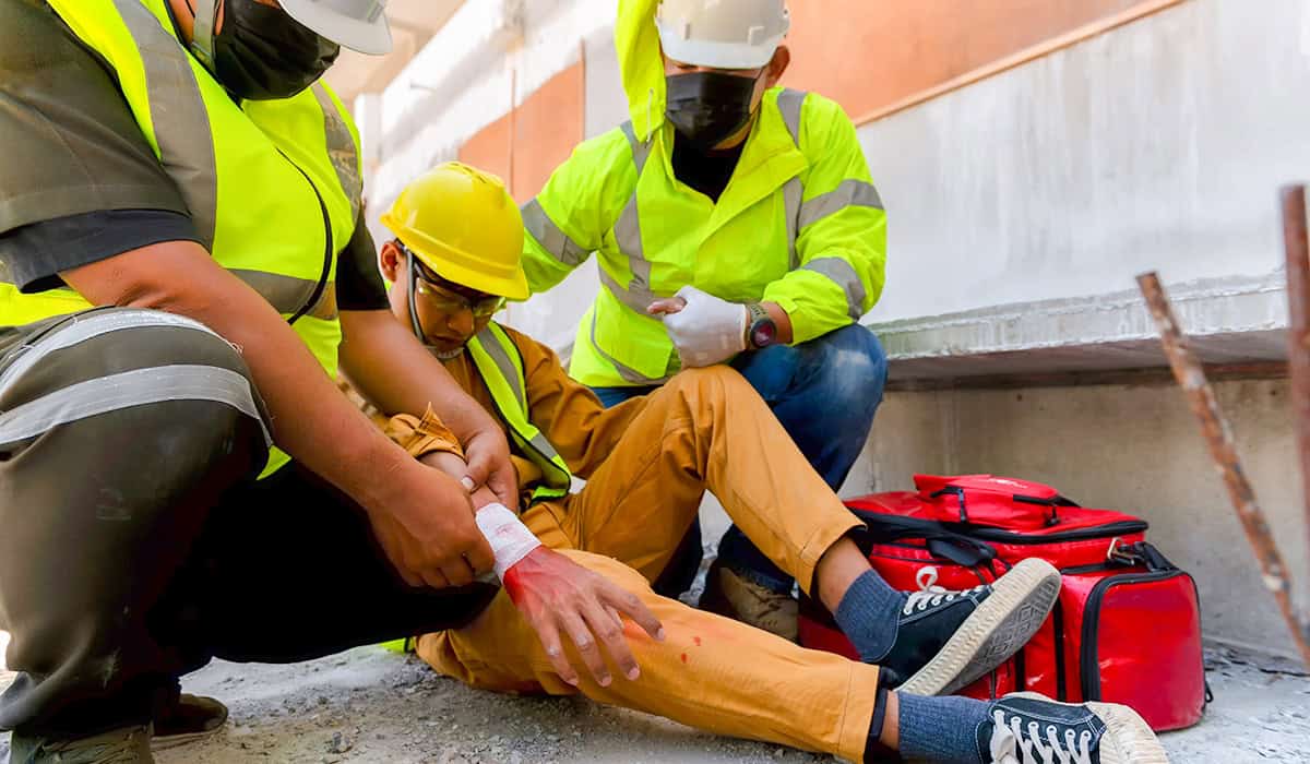 An image of a workplace accident with heavy bleeding