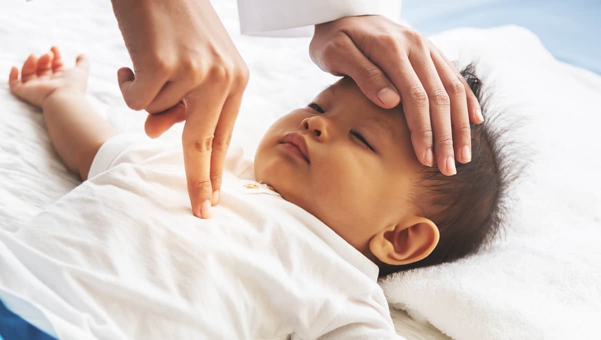 Someone delivering life-saving CPR to a child