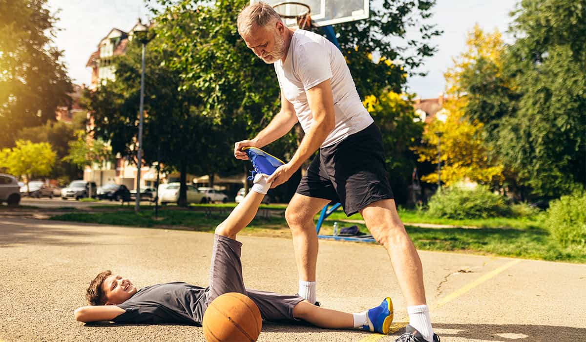An image of someone stretching a limb to identify an injury