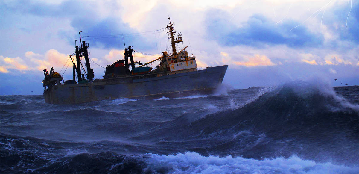 Commercial fishing boat faces rough seas