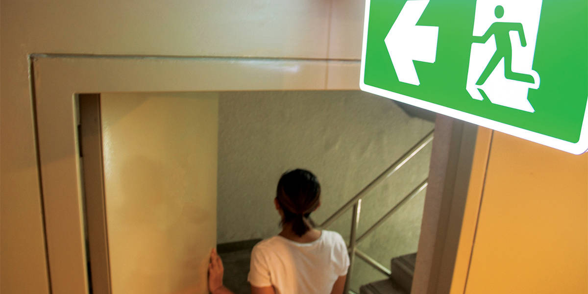 Fire exit sign mounted on the roof