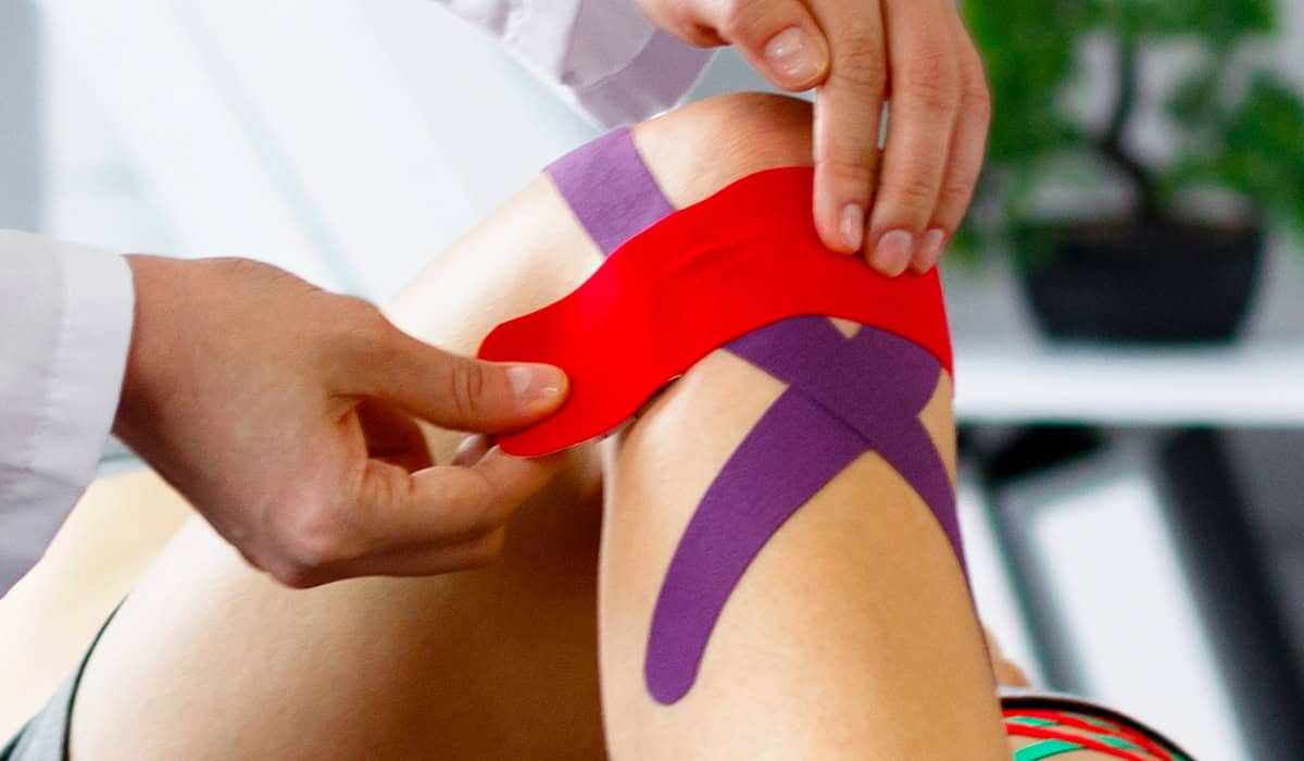 Apply waterproof strapping to a knee